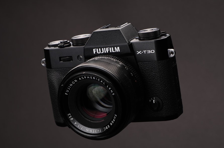  Fujifilm X-T30, a high-performance mirrorless camera that provides professional grade shooting in a smaller and lighter body. It comes with a powerful 26-megapixel X-Trans